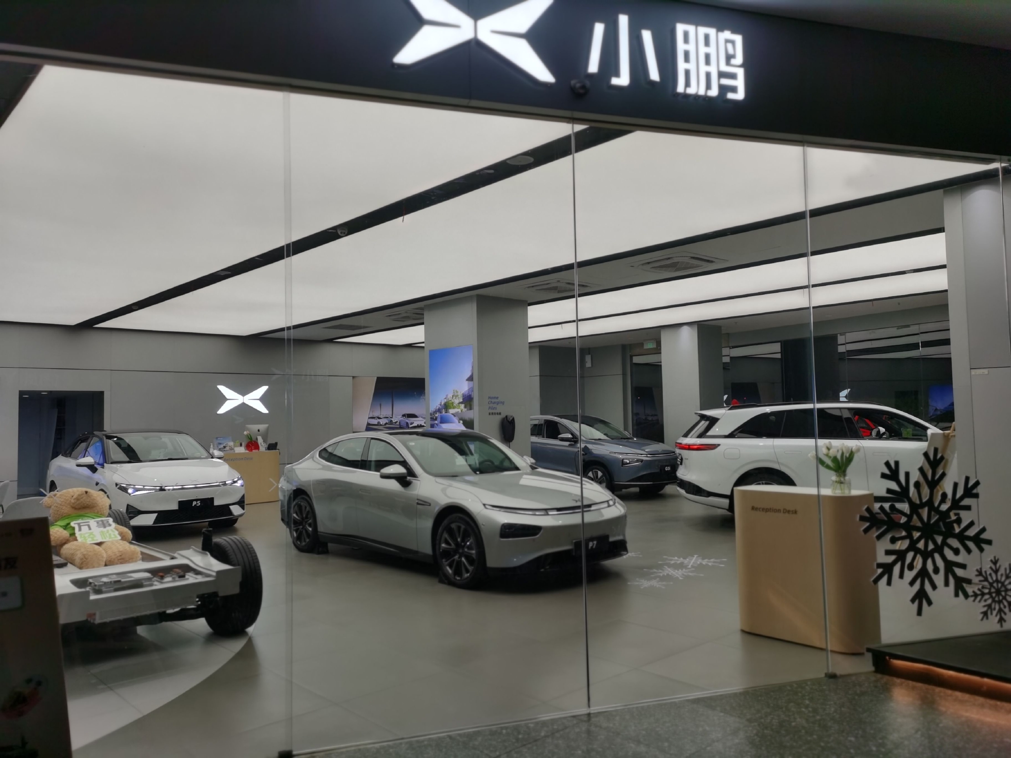 新春走基层丨新能源汽车大幅降价引发购车热潮?北京、上海略显冷淡,不少订单节前已释放